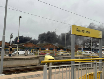 Homes evacuated after major blaze involving lorries on industrial site Image