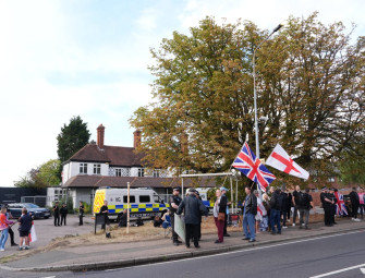 Protesters gather outside hotels housing asylum seekers after court ruling Image