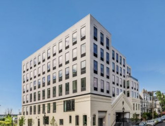 GRT Architects expands New Jersey warehouses into residences with white brick addition Image