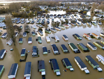 Residents at flooded waterside parks urged to stay away from their homes Image