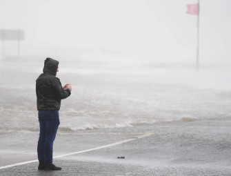 Busy city centre road closed after building collapses on to car amid Storm Amy Image