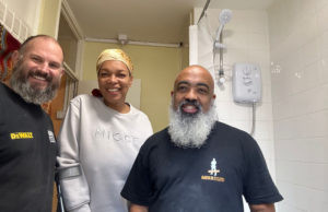 Charity volunteers complete bathroom project and receive a shower of thanks  Image