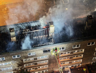 Battersea fire: 100 firefighters battle huge blaze at block of flats as 150 people forced to evacuate Image