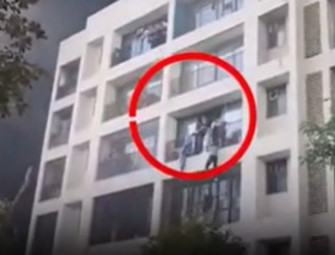 Shocking new video shows people leaping from building after Air India crash Image