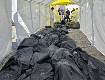 Nearly 400 human corpses found piled high at secret crematorium near Mexico-US border Image