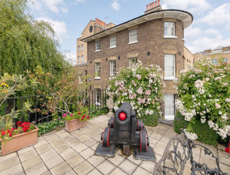 Extremely rare Georgian dockmasters house by Tower Bridge and built into the dock walls on sale for £15m Image
