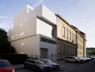 Dílna houses Brno art studios within a stack of white cubes Image