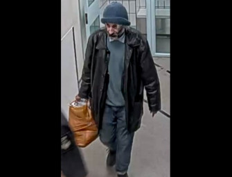 Police seek man after deliberate fire that caused significant damage to City of London building Image