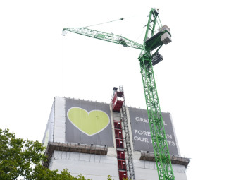 Dismantling of Grenfell Tower begins eight years after devastating fire Image