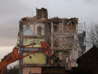 Cladding-issue flats demolished in east London months after devastating fire Image