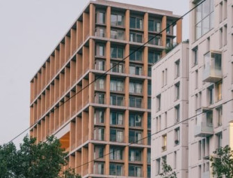 LAN deliberately exposes mass-timber structure of Paris apartment block Image