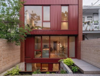 Naturehumaine uses Merlot red palette for duplex renovation in Montreal Image