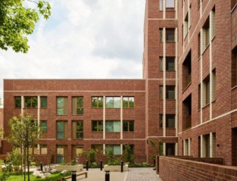 Satish Jassal Architects adds red-brick social housing blocks to London estate Image
