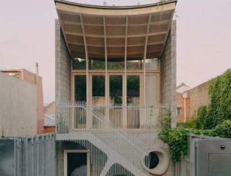 LLDS Architects tops self-designed home in Melbourne with curved plywood roof Image