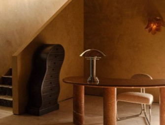 Form(LA) hides stone furniture showroom behind marble pivot door Image